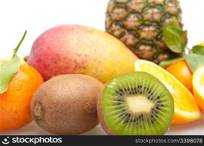Tropical Fruits - Pineapple, Oranges, Kiwi, Mango and Tangerine on White Background