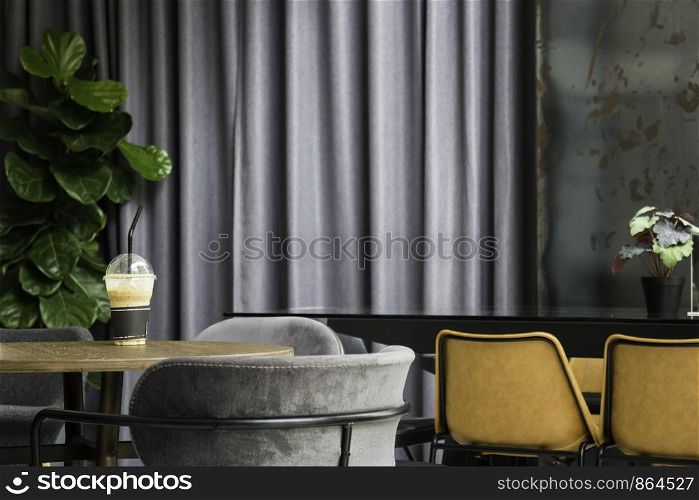 Tropical green plant interior of coffee shop, stock photo