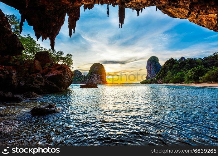 Tropical holidays  beach vacation in Thailand tourism concept - Pranang beach on sunset. Railay , Krabi Province Thailand. Sunset on Pranang beach. Railay , Krabi Province Thailand