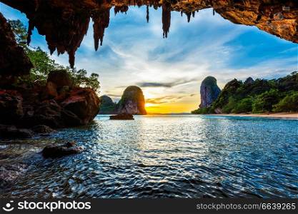 Tropical holidays  beach vacation in Thailand tourism concept - Pranang beach on sunset. Railay , Krabi Province Thailand. Sunset on Pranang beach. Railay , Krabi Province Thailand