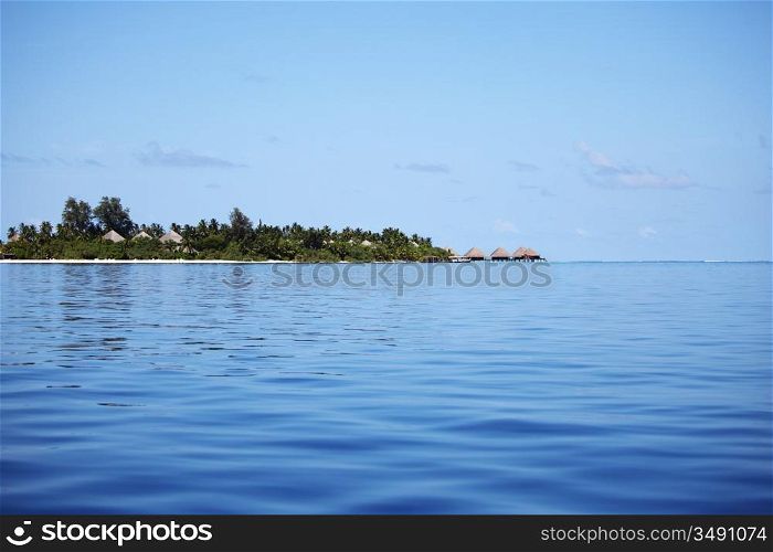 tropical island in blue sea