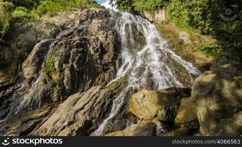 Tropical jungles waterfall in rocks