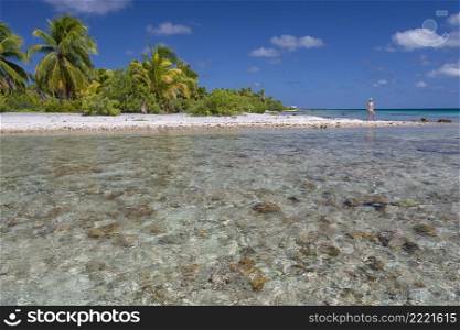 Tropical lagoon on a small island in the Mahini Islands of French Polynesia in the South Pacific.