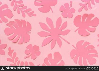 Tropical leaves pattern. Trendy pink tropical leaves of paper on pink background. Flat lay, top-down composition, creative paper art.. Tropical leaves pattern. Trendy pink tropical leaves of paper on pink background. Flat lay, top-down composition, creative paper art