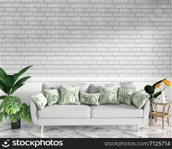 Tropical Loft interior mock up with sofa and decoration and white brick wall on granite floor .3D rendering