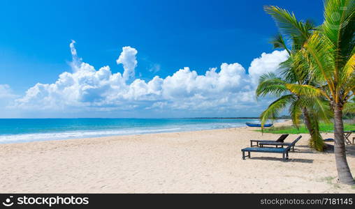 tropical Maldives island with white sandy beach and sea