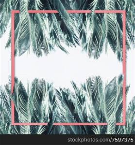 Tropical palm leaves frame at white background. Layout