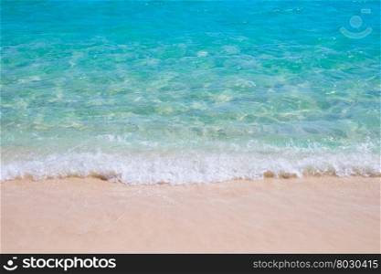Tropical sand beach and blue sea wave. Sand beach and blue sea wave
