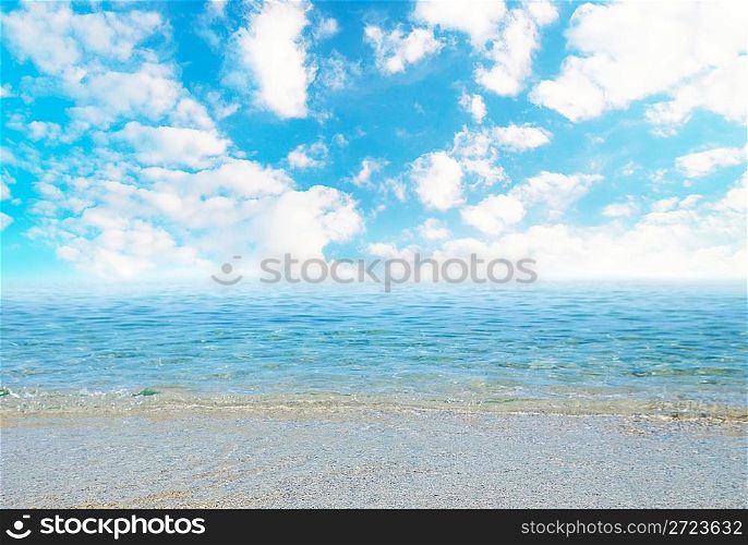 Tropical sand beach with waves and cloudscape.