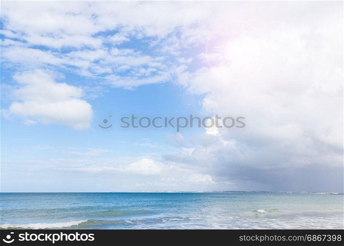 Tropical sand sunny beach and blue cloudy sly