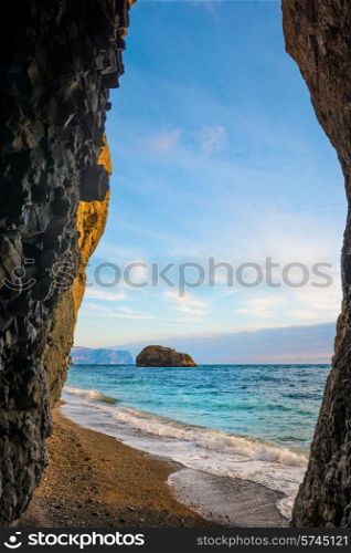 Tropical sea, rocks on the beach and blue sky with beautiful clouds