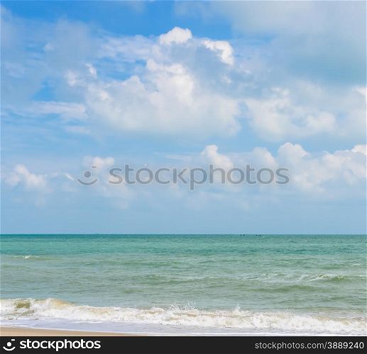 Tropical seascape and cloudy blue sky