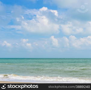 Tropical seascape and cloudy blue sky