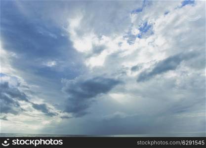 Tropical seascape. Sky with cumulus clouds and water