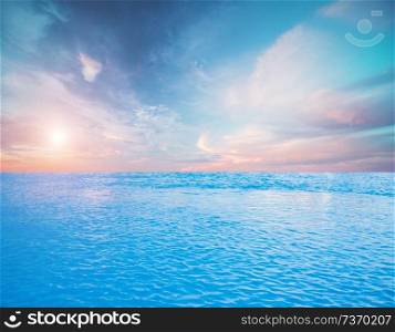 Tropical sky clouds and ocean. Tranquil seascape. Tropical sky clouds and ocean