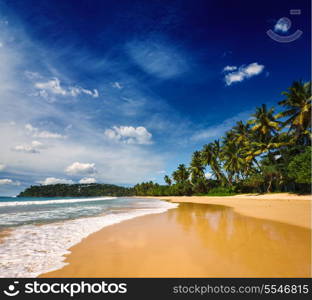 Tropical vacation holiday background - paradise idyllic beach. Sri Lanka