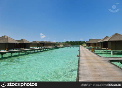 tropical water home villas resort on Maldives island at summer vacation