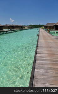 tropical water home villas resort on Maldives island at summer vacation