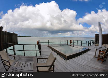 tropical water home villas resort on Maldives island at summer vacation