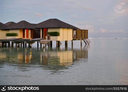 tropical water home villas resort on Maldives island at summer vacation