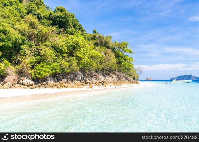 Tropical white sand beach at snoekel point from speed boat at andaman sea indian ocean Myanmar and Thailand.