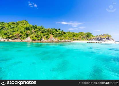 Tropical white sand beach at snoekel point from speed boat at andaman sea indian ocean Myanmar and Thailand.