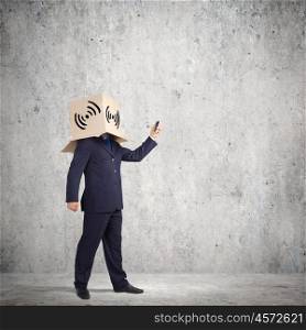 Trouble in business. Troubled businessman with carton box on head expressing emotions