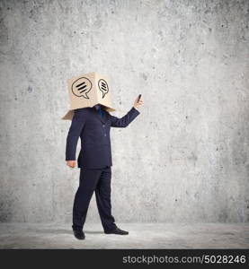 Trouble in business. Troubled businessman with carton box on head expressing emotions