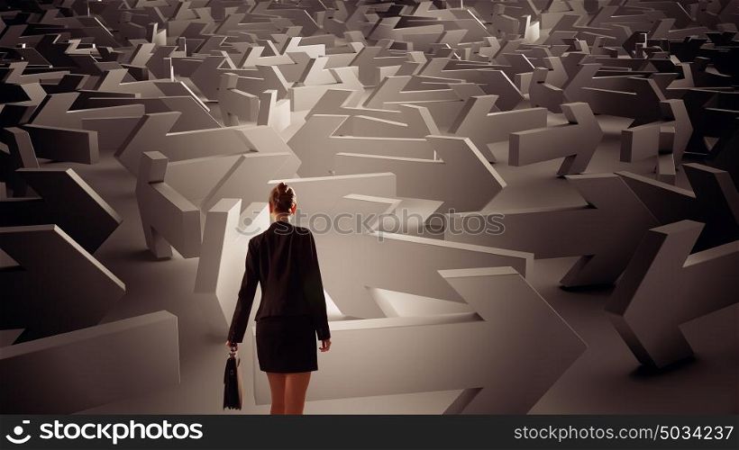 Troubled businesswoman finding way out. Young elegant businesswoman among arrows showing directions to way out