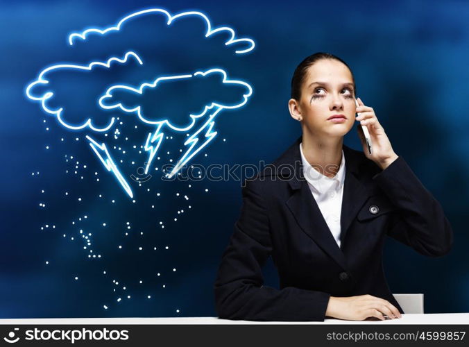 Troubled businesswoman. Young upset businesswoman talking on mobile phone