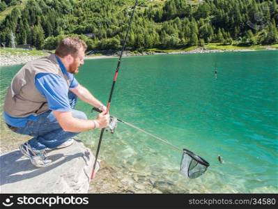 Trout-fishing on mountain lake