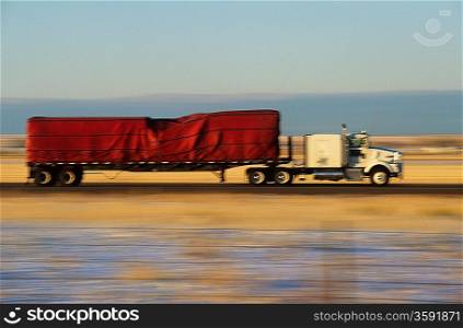 Truck on road in desert
