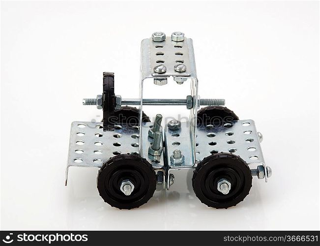 truck tractor toy - metal kit for construction on white background