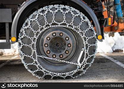 truck wheel with the snow chains