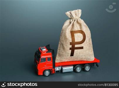 Truck with a russian ruble money bag. Financial aid, investments and subsidies. Compensation. High super income. Payment of taxes. Cash collection. Money transfers and transactions. Loan or deposit.