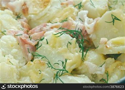Truffade - dish traditionally associated with Auvergne in France.made sliced potatoes then mixed with thin strips of tome fraiche .