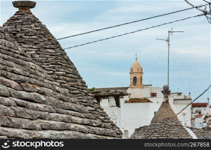Trulli houses roofs in main touristic district of Alberobello beautiful old historic town, Apulia region, Southern Italy