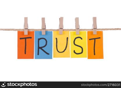 Trust, Colorful words hang on rope by wooden peg