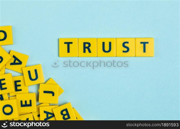trust word scrabble tiles. Resolution and high quality beautiful photo. trust word scrabble tiles. High quality and resolution beautiful photo concept