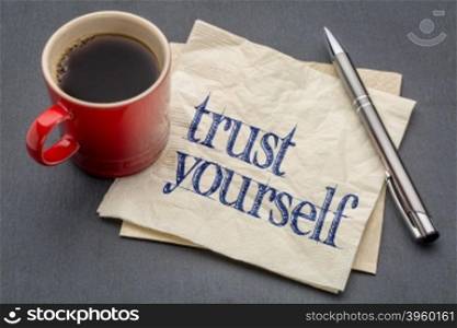 Trust yourself advice - handwriting on a napkin with a cup of coffee