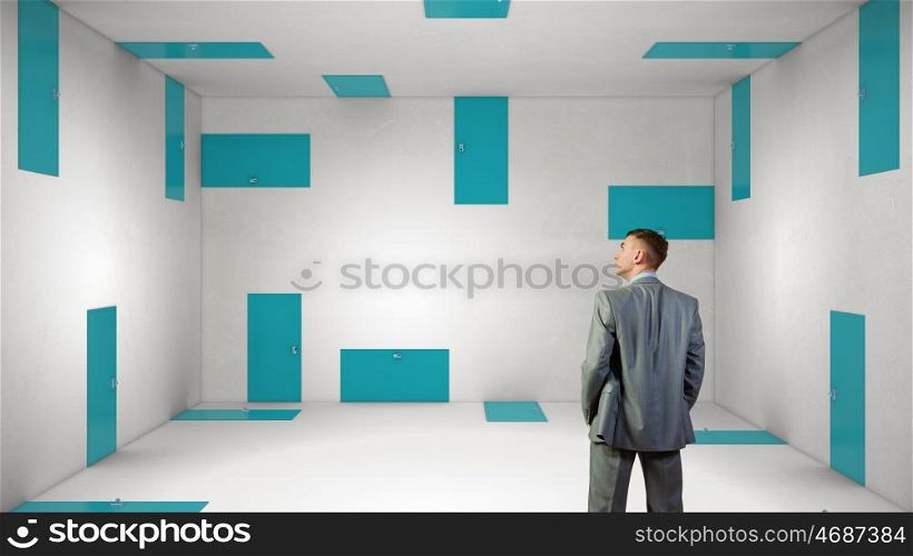 Trying to find way out. Mixed media. Businessman in room choosing one of plenty of doors