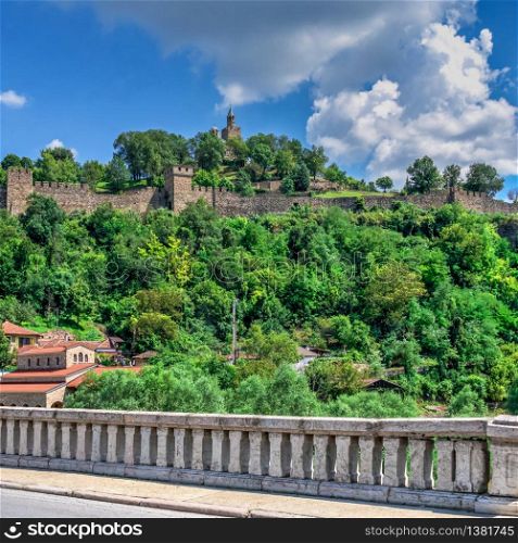 Tsarevets fortress with the Patriarchal Cathedral of the Holy Ascension of God in Veliko Tarnovo, Bulgaria. Big size panoramic view on a sunny summer day. Tsarevets fortress in Veliko Tarnovo, Bulgaria
