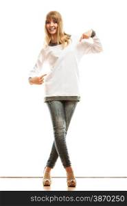 Tshirt design concept. Full length blonde fashion woman jeans pants white blank long-sleeved shirt pointing at herself isolated