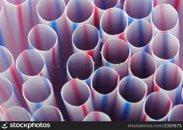 Tubules for a cocktail. An abstract background from plastic tubules