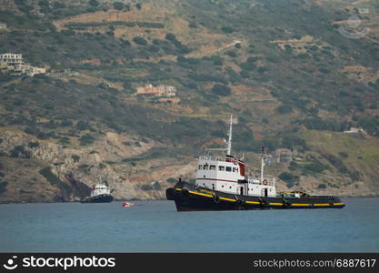 Tugboats in the port of Amoudara . Tugboats in the port of Amoudara on the island of Crete in Greece