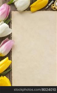 tulip flowers on wood background