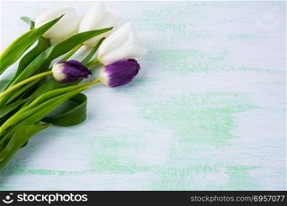 Tulips floral background. Flower frame. Flower background. Flower bouquet. Greeting card. Mothers day. Flowers. Flower pattern. Flower border. Place for text. Copy space. Tulips floral background