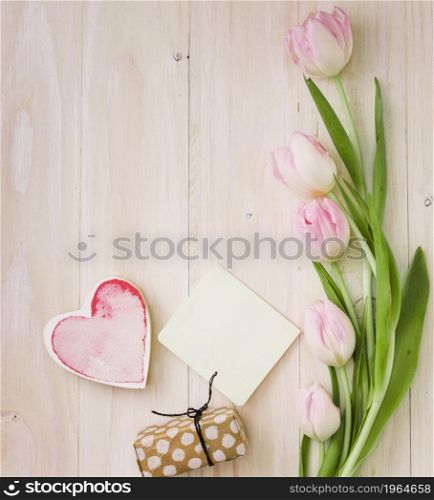 tulips with gift box paper table. High resolution photo. tulips with gift box paper table. High quality photo