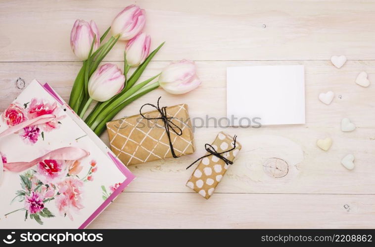 tulips with gift boxes blank paper