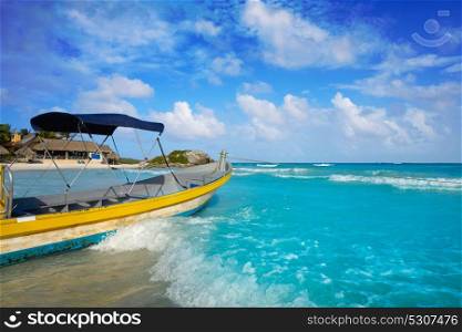 Tulum Caribbean turquoise beach boat in Riviera Maya of Mayan Mexico
